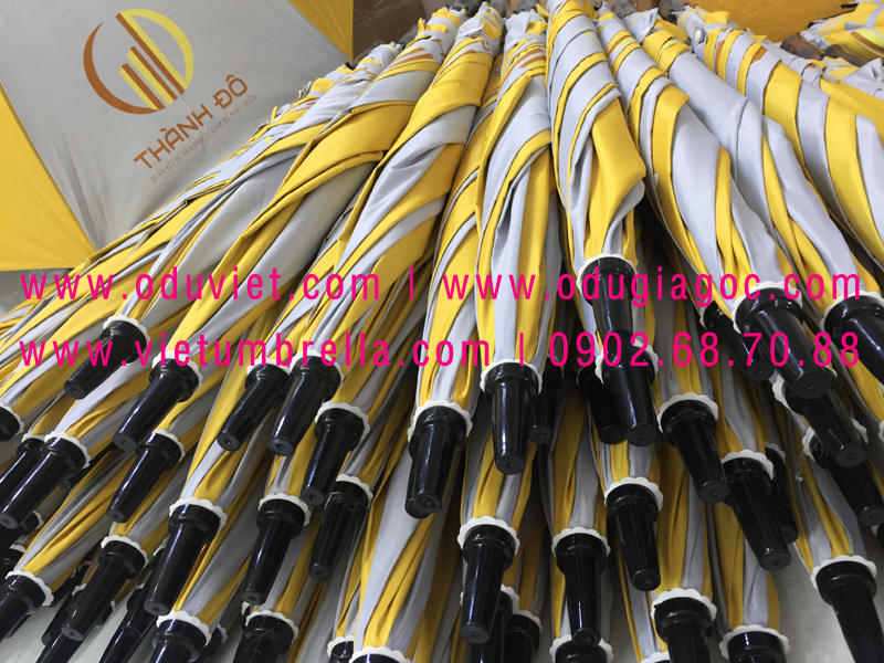 xưởng sản xuất ô dù cầm tay in logo quảng cáo